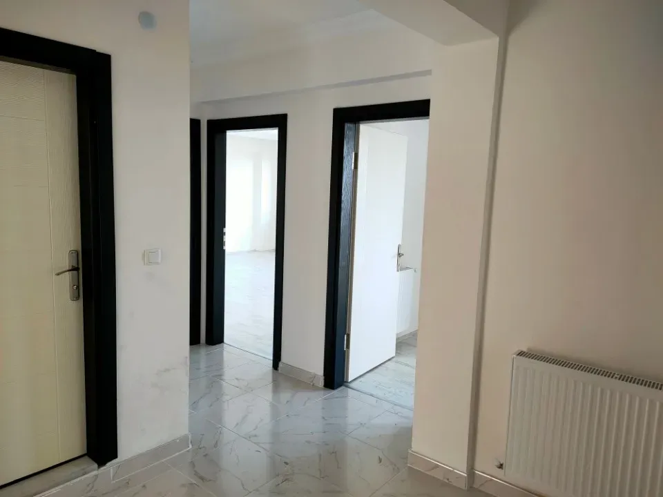 32 EVLERDE ŞEHİR MANZARALI YERDEN ISITMA 3+1 ARA KAT YENİ DAİRE